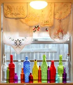 Window sill with colored bottles